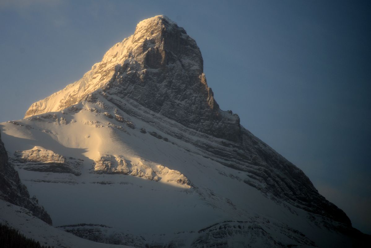 09A The Three Sisters Faith Peak Close Up From Canmore In Winter Just After Sunrise